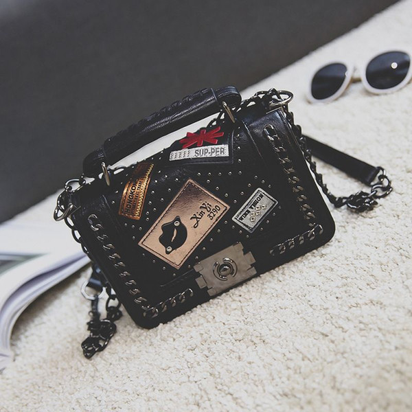 The new type stereotypic lock small square bag multi-element medal single shoulder cross - shoulder bag Popular personality