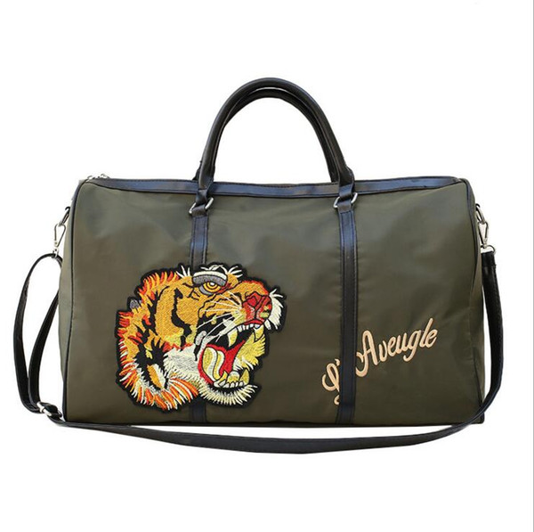 2018 Luxury Brand Style women men duffle bag Famous designer tiger head embroidery big travel bags woman luggage bag men