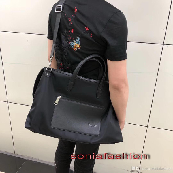 Hot sell fashion man bag designer unisex made of waterproof marital and leather handle man casual should bag for traveling