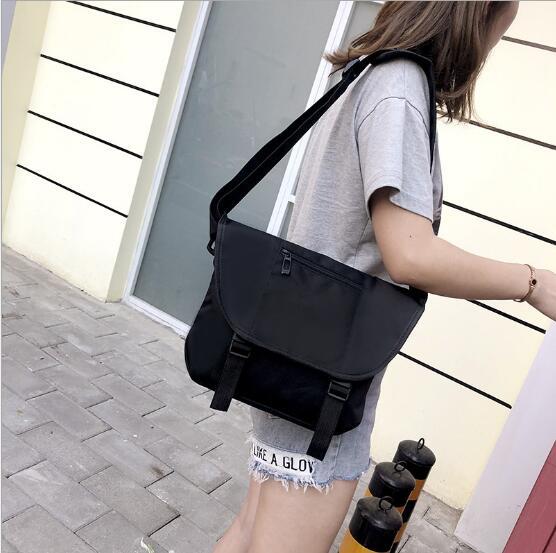 Explosion models Japanese Harajuku style canvas shoulder bag slanting original street shooting men and women super fire postman bag student