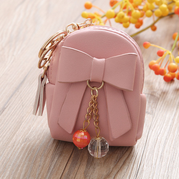 Korean version of the small bag bow pendant zip coin purse Mini wallet PU Material With Four Colors