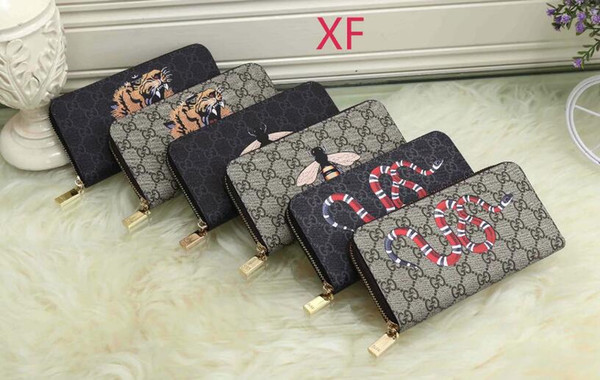 Hot sales 2017 hot new product lady wallet!From Italy's high-end luxury handbags,Embroidered snake designs pu purse