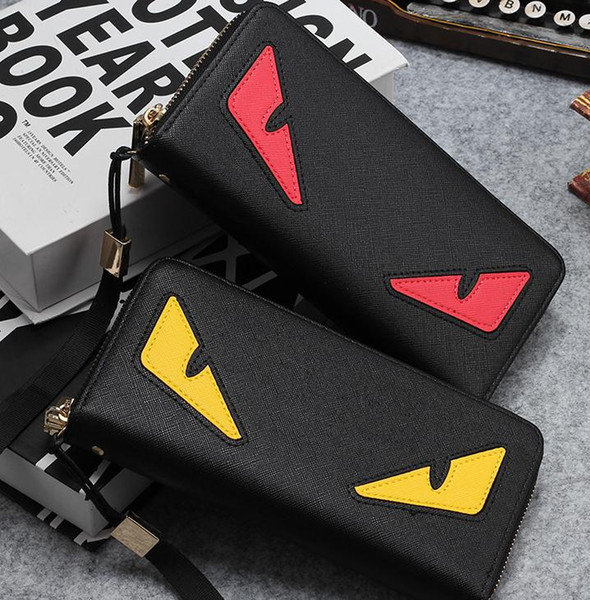 Wholesale- 2019 New brand men's wallet zipper long phone clutch bag fashion high quality guarantee eyes purse clutch wallet free shipping