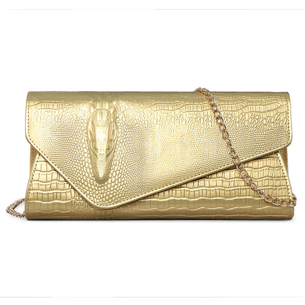 The new factory direct wholesale crocodile pattern shoulder diagonal Ms. clutch evening bag packet female Material: pu