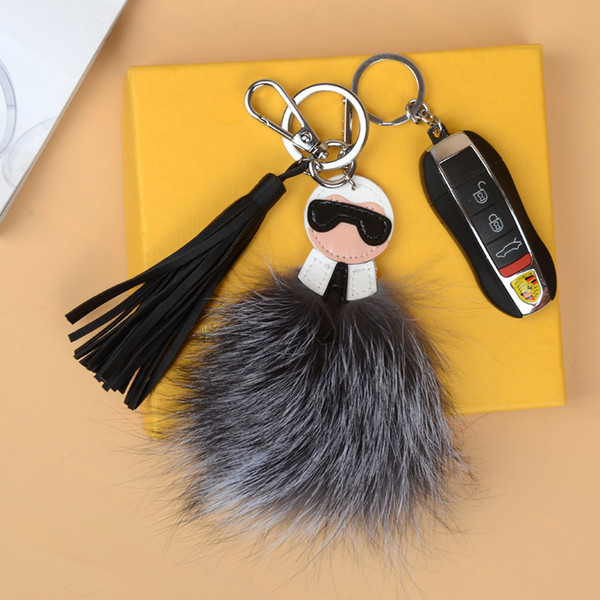 2018 luxury logo Fluffy Karl Genuine Raccoon Fur Pompom Monster Bag Bugs Charm Keychain Plush Key Ring Leather Tassel Pompom
Fendi