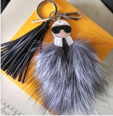 luxury logo Fluffy Karl Genuine Raccoon Fur Pompom Monster Bag Bugs Charm Keychain Plush Key Ring Leather Tassel Pompom K001-green