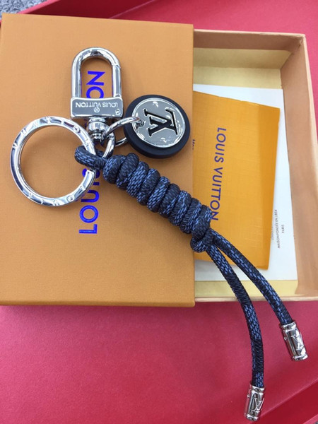 Manual high-grade braided rope brand key chain men and women leather car key chain ring leather rope bag stainless steel pendant hp252a