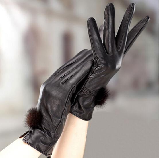 Winter and spring ladies new fashion cute rabbit fur ball warm leather motorcycle gloves for women black free shipping