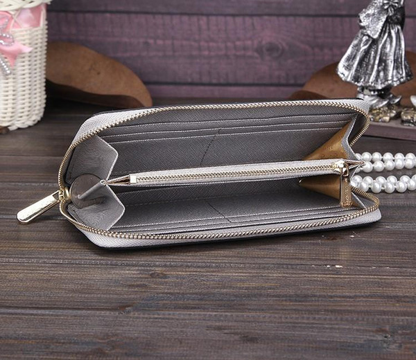 AAA woman high quality famous brand long single zipper Genuine Leather wallet Cross pattern 008 purse with box card