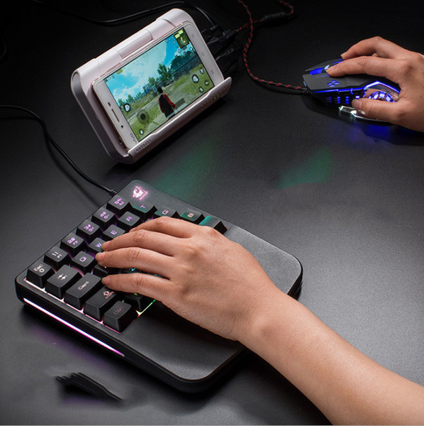 It is the free Wolf K11 single-hand keyboard mechanical touch game left pistol throne mobile game keyboard