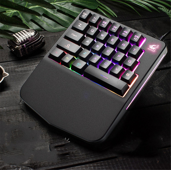 It is the new free Wolf K11 single-hand keyboard mechanical touch game left pistol throne mobile game keyboard