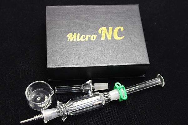 Hot Selling 10mm Micro NC Nectar Collector Kit with Titanium Tip Ash Catcher Dab Straw Mini Glass Pipe Glass Bongs free shipping