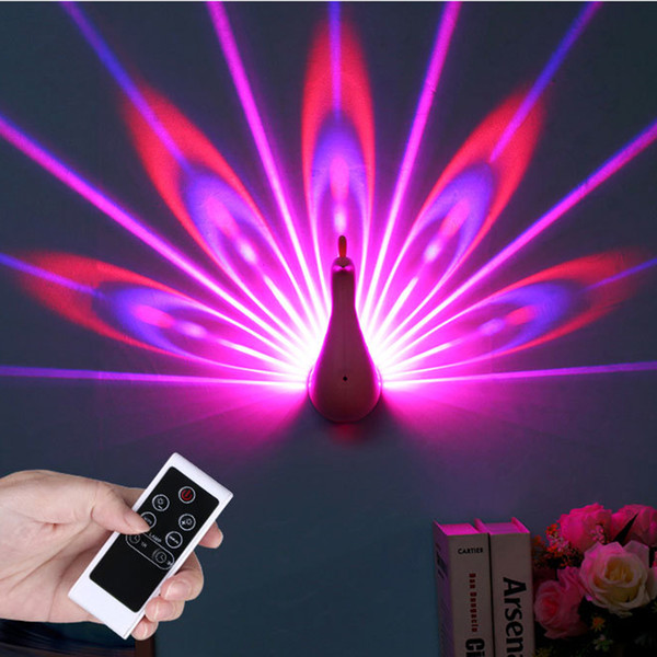 Hot-selling creative peacock projector light novelty home atmosphere lamp colorful LED night lamp bedside wall lamp