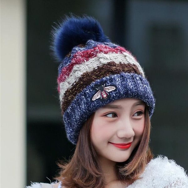 Europe and America Female Fahion Mixed Color Kintted Hats 2018 New Winter Lady Thick Warm Caps With Bee Pattern and Fur Balls