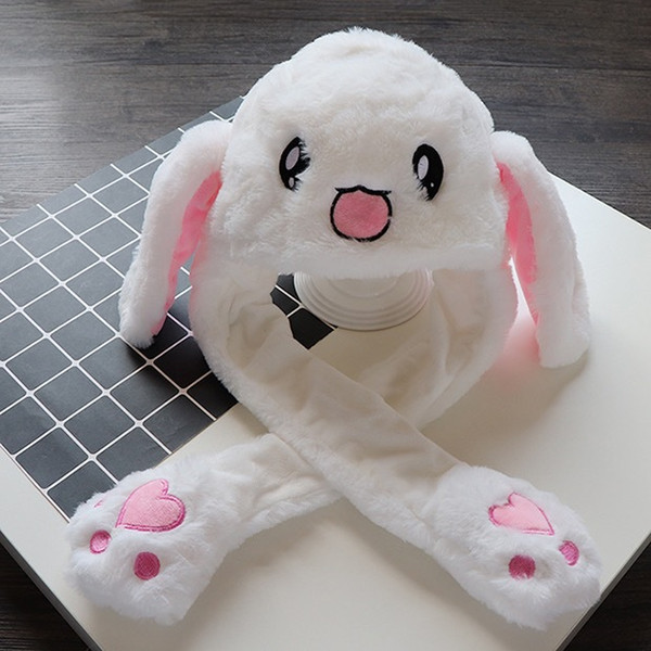 A cap with moving ears. Rabbit ears. Lovely little rabbit, baby cap, adult parent and child