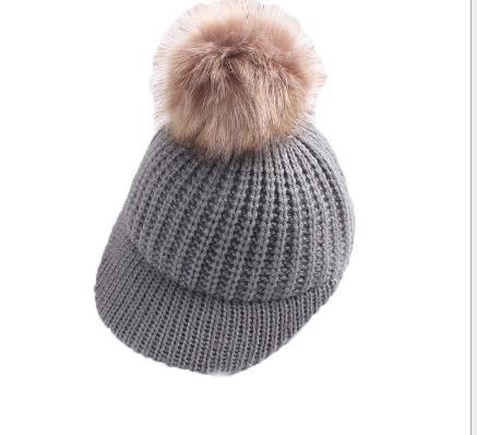 New boys'and girls' hats for autumn and winter babies with duck tongue caps and hairballs knitted baseball caps for 2-4 years old