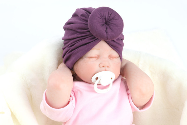 New Fashion Cute Baby Unisex hat Colorful Spring hat Cute Baby Donut elastic Hat Solid Color Cotton Hairband