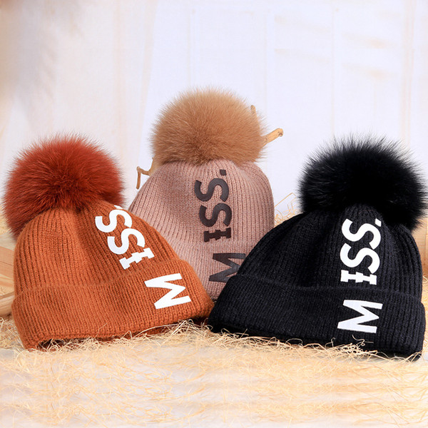 Autumn and winter fur ball hat female casual wild fashion letters 15CM fox fur ball wool hat warm earmuffs knit