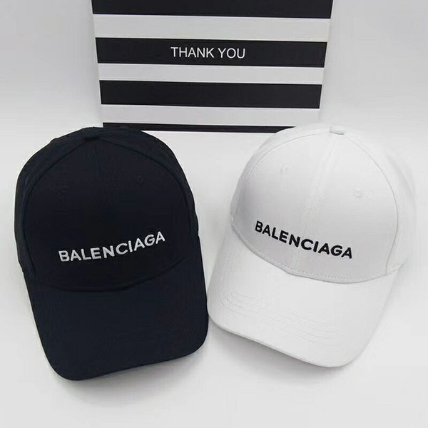 Unisex baseball cap new spring and summer letters embroidered solid color visor casual wild very good looking couple models