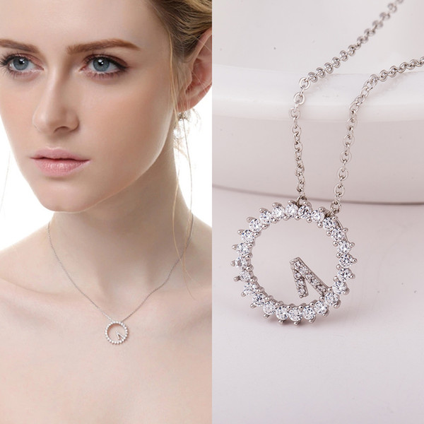 Korean version of the beautiful zircon clock necklace hollow out quality 520 clock clavicle chain couple gift items wholesale