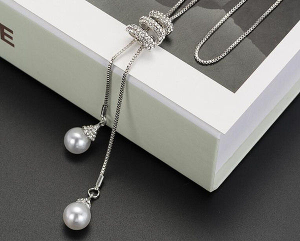 Women's long paragraph simple fashion beautiful temperament artificial pearl pendant long necklace clothes pendant high-end design accessori