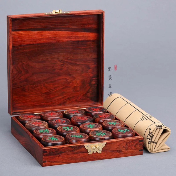 Chinese chess big red acid branch toe yellow sandalwood red wood chess box set household wood carving fairy as a business gift.