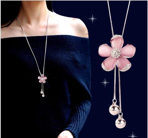 Korean version of Baitao temperament cat's eye stone flower autumn and winter new sweater chain long necklace pendant for women