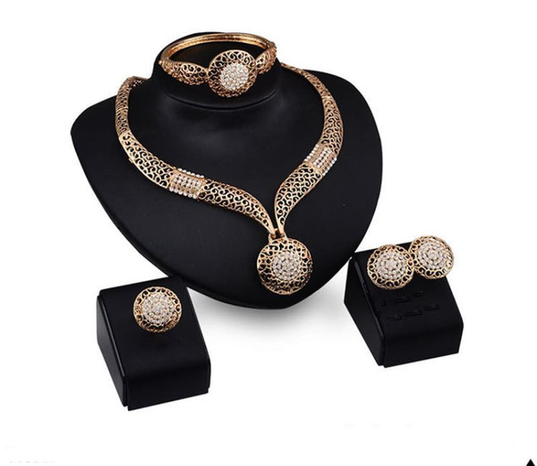 Exaggerated Rhinestone Jewelry Set Metal Hollow Out Necklace Earring Ring And Bracelet In One Set Wholesale