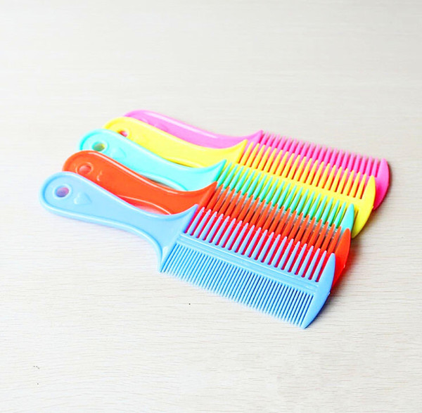 Double-sided color comb Yiwu small commodity wholesale source of ground stand 2 yuan shop daily goods wholesale