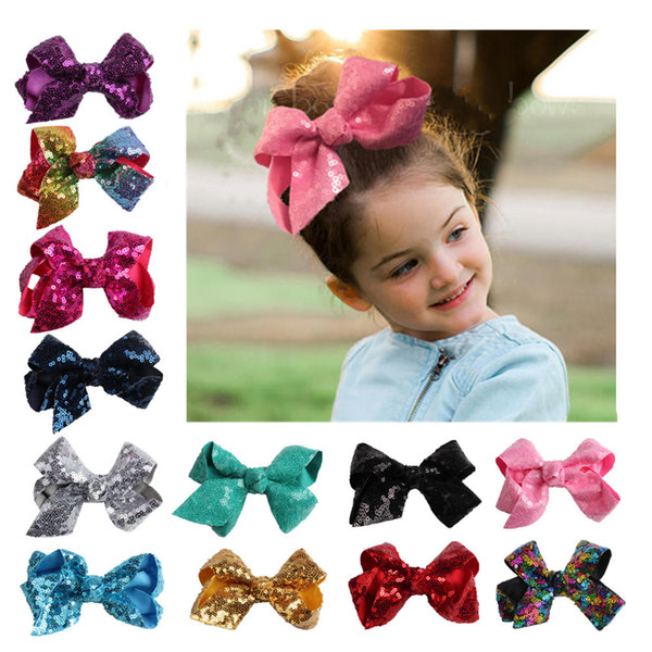 The new European and American children's fashion accessories fashionable sequined bow hairpin free shipping.