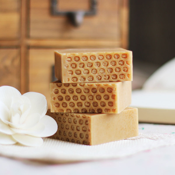 HAND MADE SOAP FOR MOISTURE SOFTENS FACE AND PROTECTS AGAINST THE DRYING EFFECTS OF THE SUN