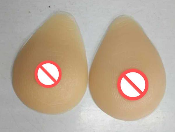 Free shipping 2018 hot selling silicone breast forms triangle teardrop-shaped for shemale transgender artificial prosthesis 300-1400g/pair