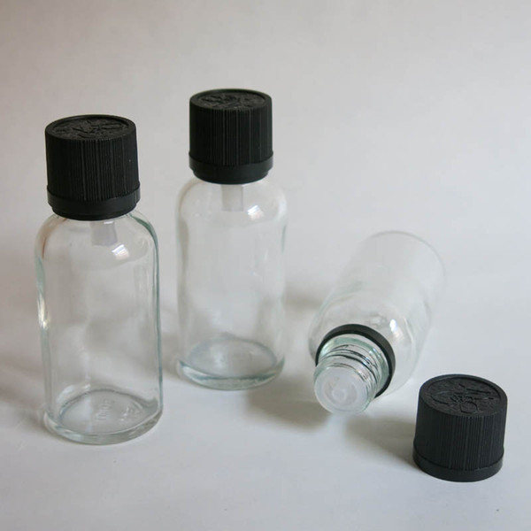 wholesale wholesale 30ml clear glass bottle with reducer dropper and tamper evident lid,30ml screw on clear essential oil bottle