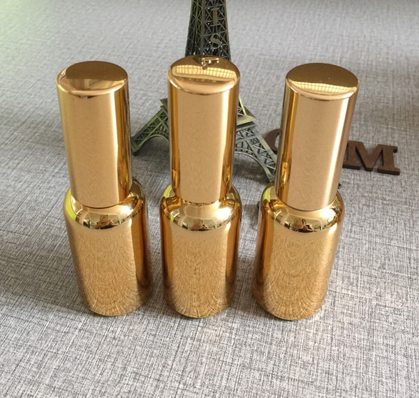 Wholesale 100pcs high grade 30ml glass lotion bottles with pump and gold 50 ml glass lotion bottle with aluminium mist cap