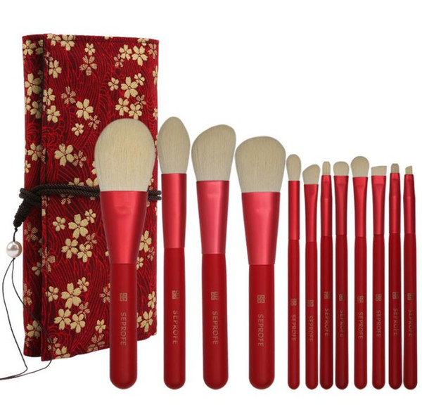 Best selling 12pcs/Set Makeup Brushes high quality nylon wool soft and skin friendly with printing Brush package free shipping.