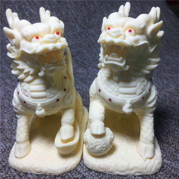 Ivory powder pressing precision carving Lucky Qilin town house Nafu decoration opening gift gift box