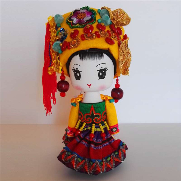 The characteristics of Yunnan minority ethnic handicrafts doll 56 colorful wooden doll ornaments awa