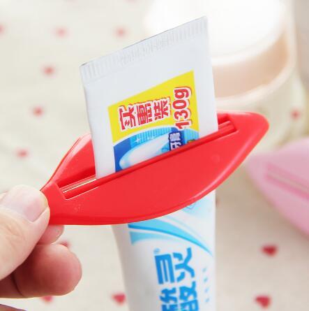 free shipping practical Multifunction creative red lips toothpaste dispenser sealing clip Peelers home bathroom tool