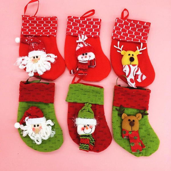 100Pcs /Lot Christmas Stocking Tree Accessories Santa Snowman Deer Socks Holder Hanging Gift Bags New Year Party Decorations Hx 304