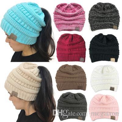 Winter hot sales in Europe and the United States CC labeled hollow top knitting hat hole head warm hat