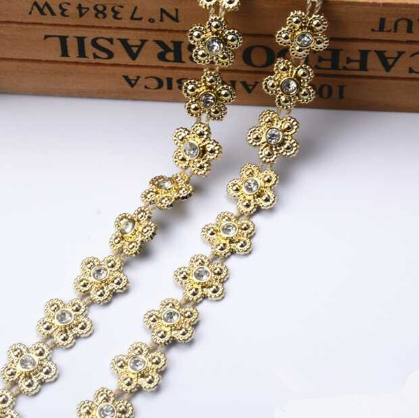 free shippment rhinestone crystal sewing lace beaded,plastic base rhinestone trimming for shoe/bag/closing decoration