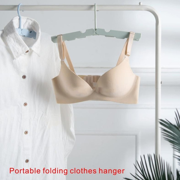 Portable folding clothes hanger Multi-function travel Clothes hanger Save space Portable Non-slip Laundry must 4 colors are optional.