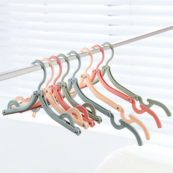 The portable travel folding clothes rack Outdoor travel multi-function magic clotheshorse Plastic non-slip hanger 31 g