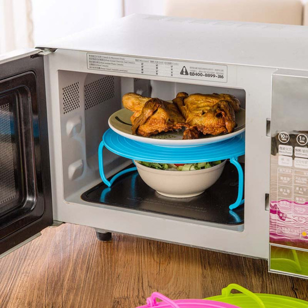 4 in 1 microwave plastic stand, it's a tray, plastic stacker a lid and a cooling rack