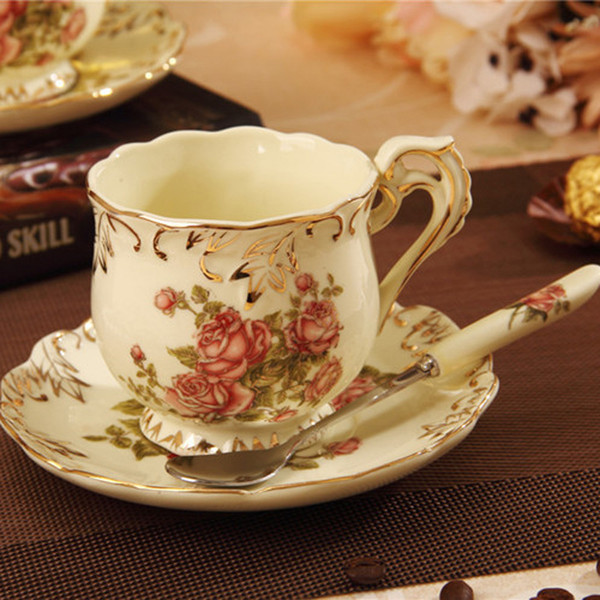 Porcelain tea cup and saucer ivory porcelain coffee cup flowers design handpainted outline in gold tea cup and saucer and spoon