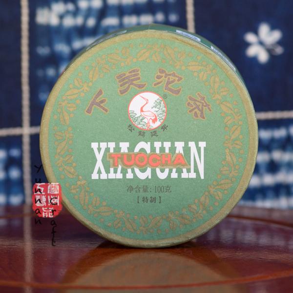 2014 Xia Guan Tuo Cha ( Te Ji ) - Shen ( green / raw ) pu-erh tea pressed into the tuo