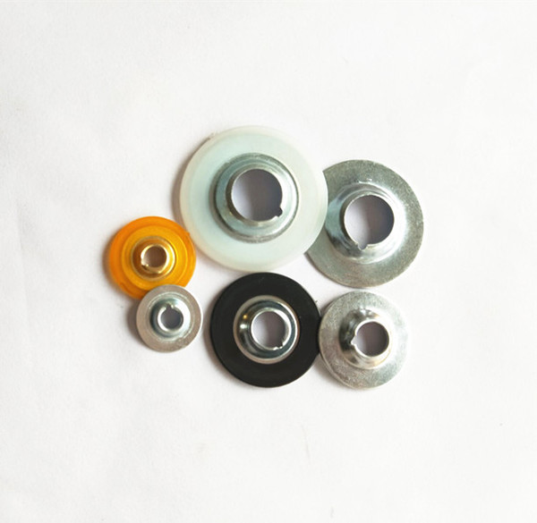 Metal plastic buttons for quick change discs