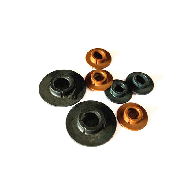 Nylon buttons for quick change discs