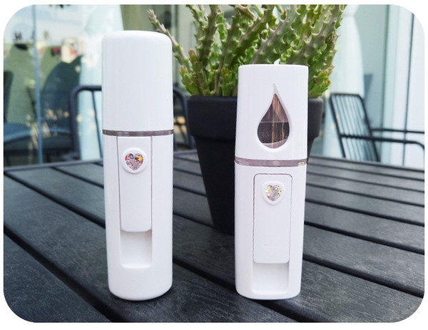 The new beauty facial steamers apparatus USB charging convenient nano spray, face humidifier, cold spray, hand held water replenishing instr