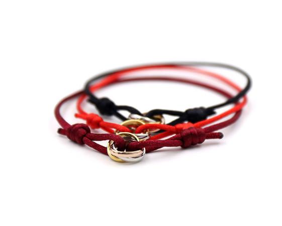 Hot fashion titanium steel jewelry wholesale three color three ring titanium steel couples hand rope